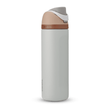 Full profile shot of the 24oz 'Calm Waters' FreeSip water bottle, highlighting its soothing blue-grey and tan color design.